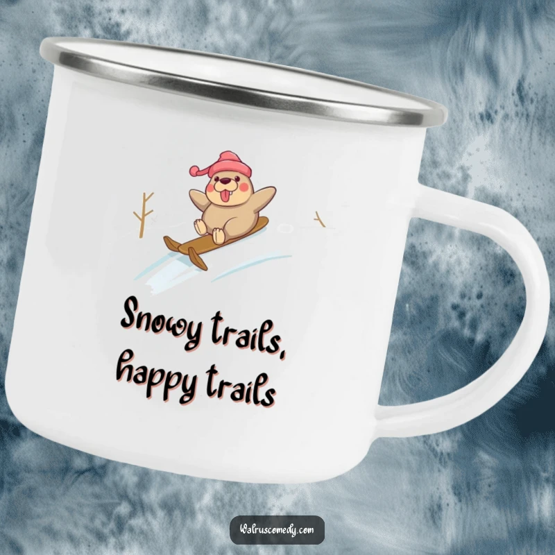 Funny camping mug featuring a walrus joyfully sliding down a snowy hill, ideal for humorous winter outdoor beverage enjoyment.
