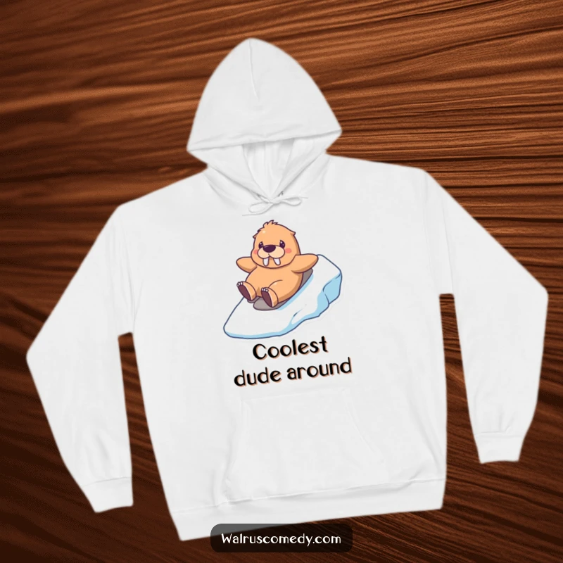 Funny kawaii walrus hoodie showing a happy walrus sliding down an icy hill, perfect for staying warm and embracing winter.
