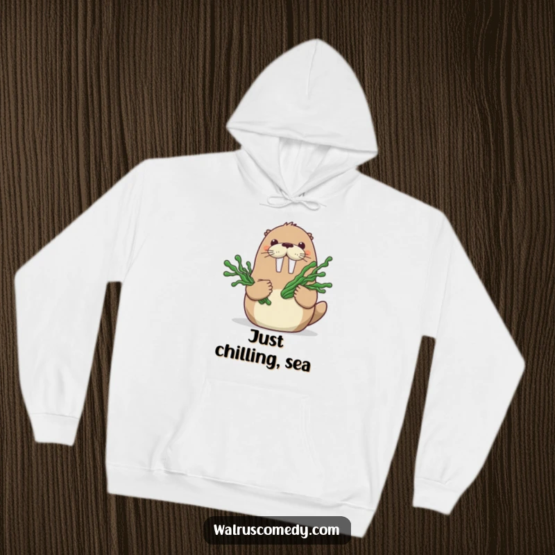 Funny hoodie with a happy walrus character holding a bouquet of seaweed, embodying gentle affection and oceanic charm.