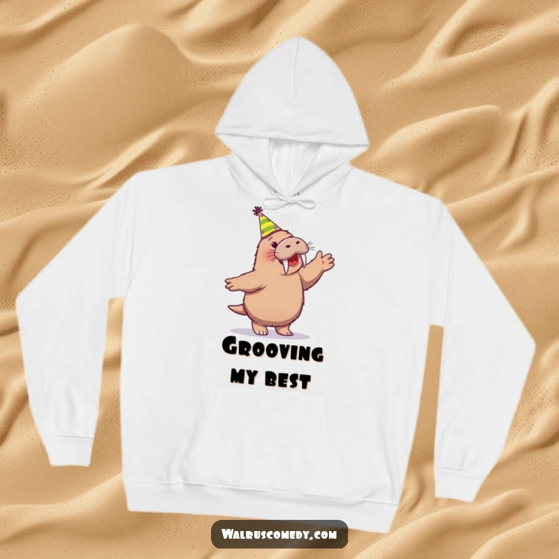 Funny hoodie with a happy walrus character joyfully dancing while wearing a festive party hat, perfect for celebrating.