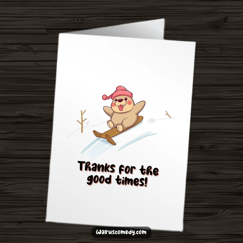 Funny Free Printable Thank You Card: Walrus enjoying a gleeful slide down a snowy hill, sending thanks with winter fun.