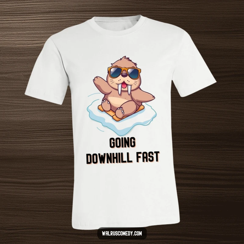 Funny kawaii walrus wearing sunglasses gleefully slides down an icy slope, embodying speed and fun on this t-shirt.