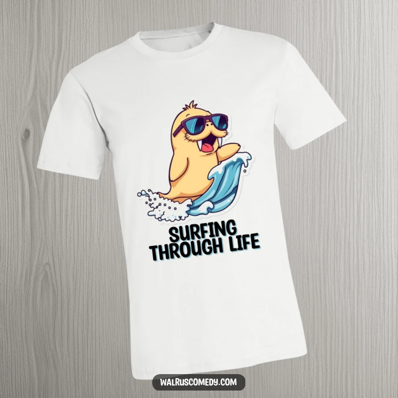 Funny walrus character t-shirt wearing cool sunglasses, excitedly riding a wave, a great funny gift for ocean lovers.