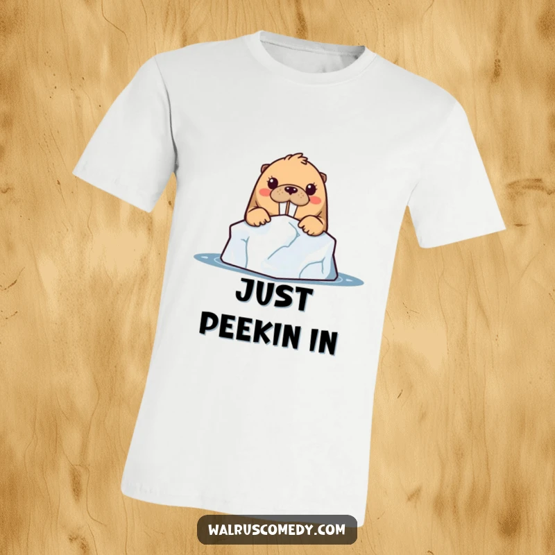Funny kawaii walrus character curiously peeking from behind a large iceberg, its eyes full of wonder on a t-shirt.