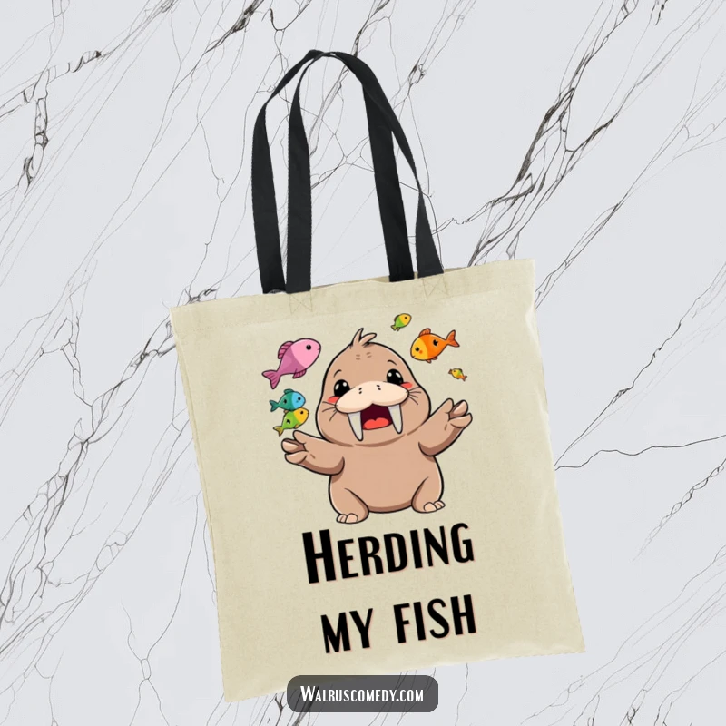 Funny Tote Bag with a happy walrus character juggling multiple colorful fish with a big smile.